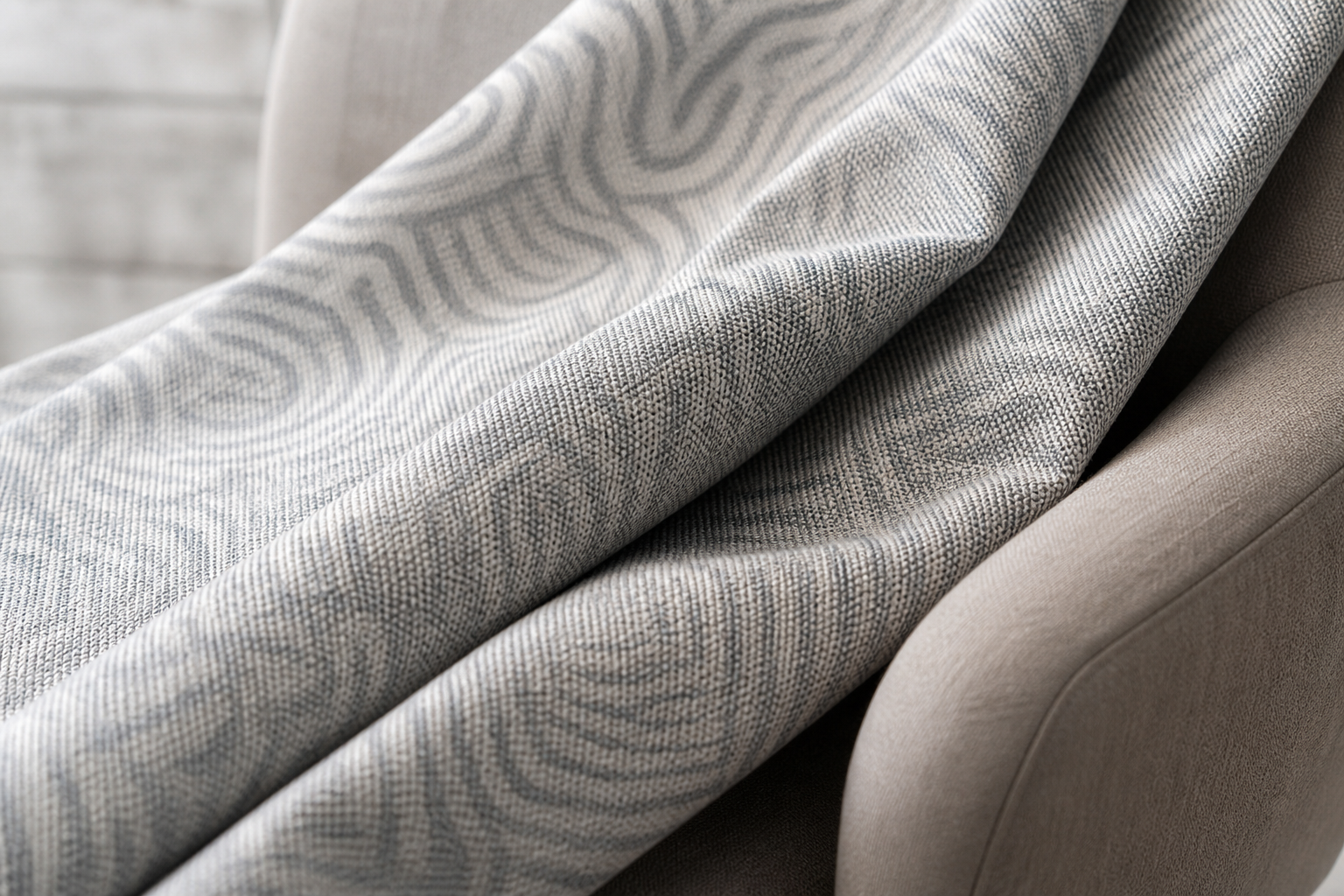 Sunbrella David Rockwell Fabric: 6 Amazing Designs for a... 4 A luxurious outdoor lounge area featuring a sectional sofa and accent chairs upholstered in Sunbrella David Rockwell Fabric, with a mix of solid and patterned cushions, set against a backdrop of modern architecture and a swimming pool. Sunbrella David Rockwell Fabric.