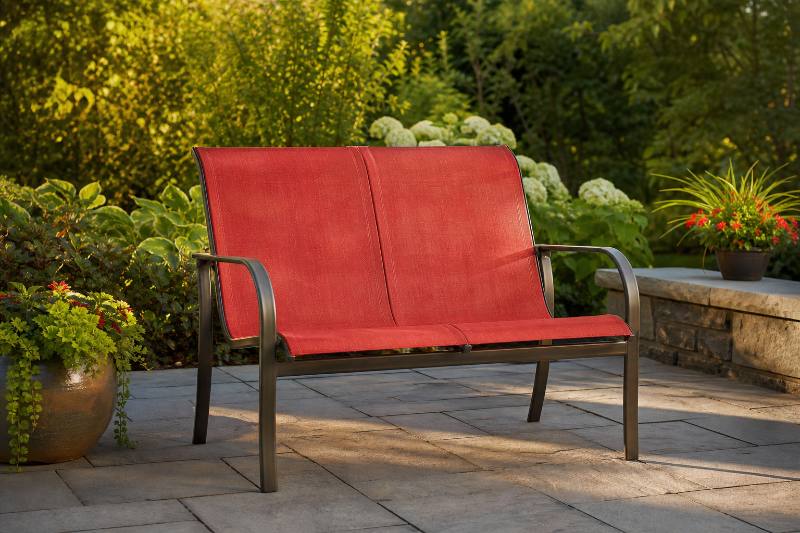 Loveseat Sling Care: 7 Proven Tips for Extended Outdoor Life 3 A vibrant, clean outdoor loveseat with a new sling fabric, set against a sunny patio backdrop. Focus on the texture and pristine condition of the Loveseat Sling Care.